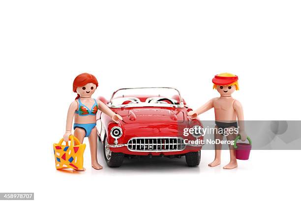 playmobil figurines at the beach - playmobil stock pictures, royalty-free photos & images