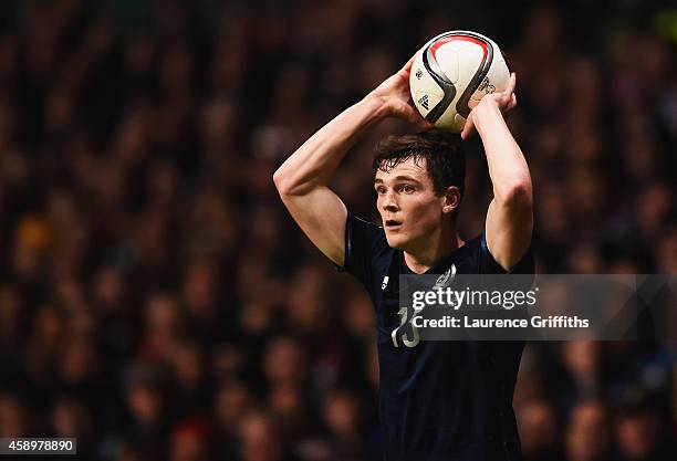 Andrew Robertson of Scotland takes a throw in during the EURO 2016 Group D Qualifier match between Scotland and Republic of Ireland at Celtic Park on...