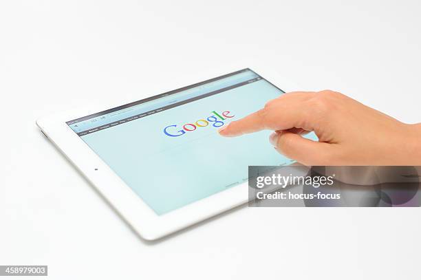 google sur ipad 3 - share photos google photos et images de collection