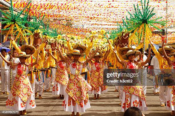 sinulog dancers in the streets of cebu - cebu province stock pictures, royalty-free photos & images