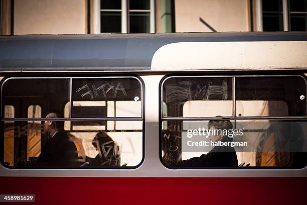 people on prague streetcar - prague tram stock pictures, royalty-free photos & images