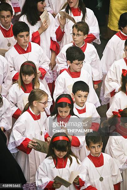 altar boys during the celebration of holy week - altar boy stockfoto's en -beelden