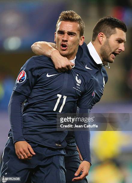 Antoine Griezmann of France celebrates his goal with Andre-Pierre Gignac during the international friendly match between France and Albania at Stade...