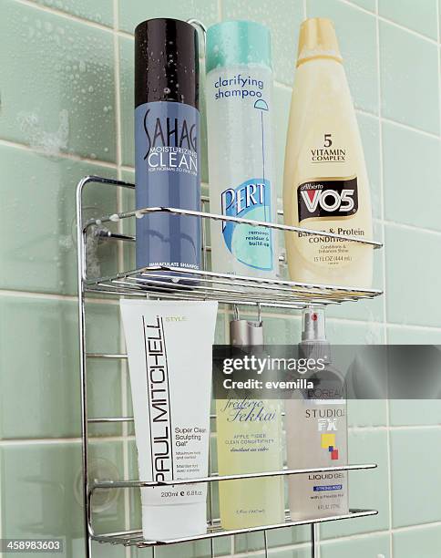 shower caddy with hair care products. - hair editorial stock pictures, royalty-free photos & images