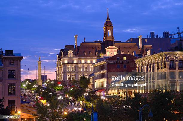 city hall and place jacques-cartier in montreal, quebec at night - vieux montréal stock pictures, royalty-free photos & images