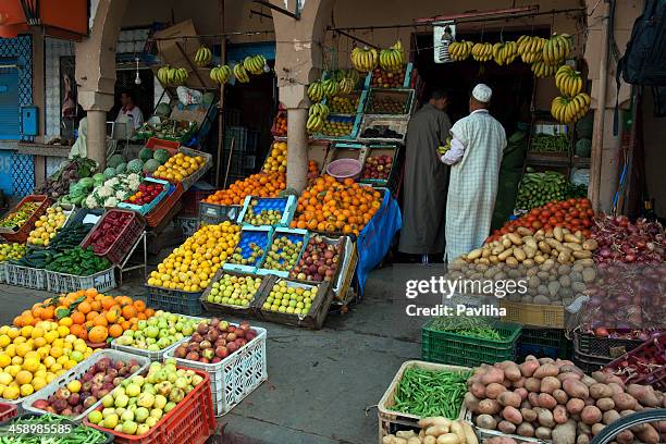 fruit and vegetable market in tiznit morocco - low hanging fruit stock pictures, royalty-free photos & images