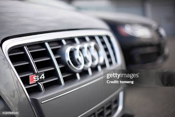 audi vehicles at a car dealership - audi showroom stock pictures, royalty-free photos & images