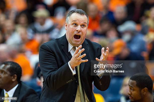 Head coach Jimmy Lallathin of the Kennesaw State Owls reacts to a call against the Syracuse Orange during the first half at the Carrier Dome on...