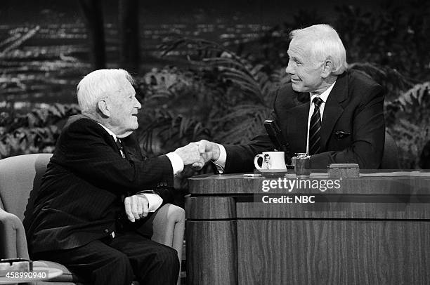 Pictured: Dr. Henry Merritt Stenhouse during an interview with host Johnny Carson on May 17, 1990 --