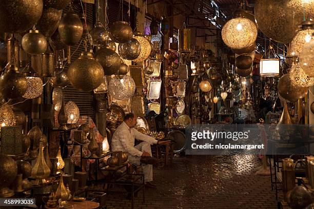 marrakech, morocco: the souk - nicolamargaret stock pictures, royalty-free photos & images