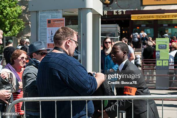 security control under eiffel tower - french-security-police stock pictures, royalty-free photos & images