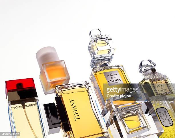 bottles of perfume - about you brand name stock pictures, royalty-free photos & images