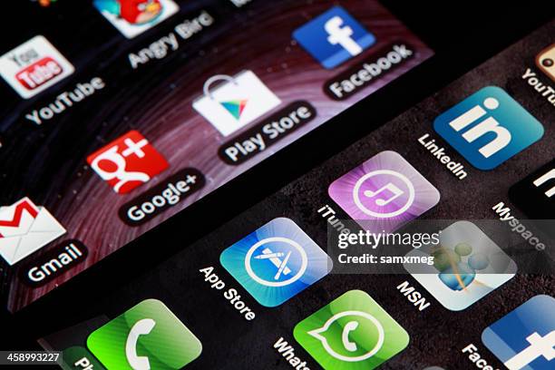 iphone and android - android apps stock pictures, royalty-free photos & images