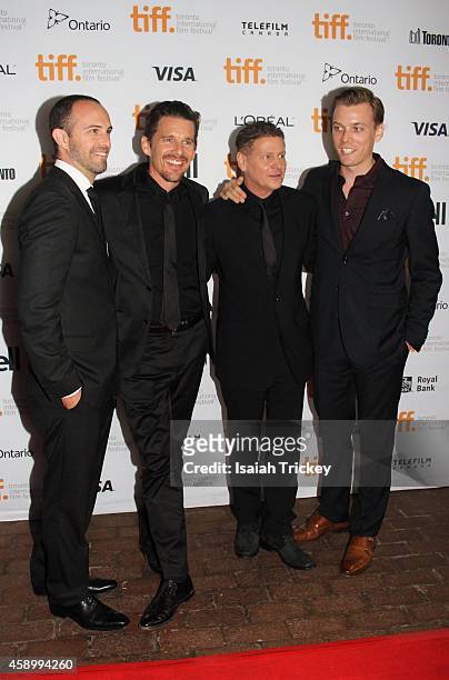 Producer Zev Foreman, actor Ethan Hawke, director Andrew Niccol, and actor Jake Abel arrive at the 'Good Kill' Premiere during the 2014 Toronto...