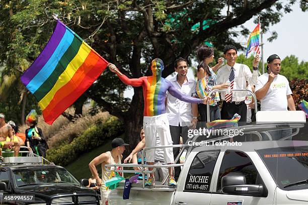 gay pride parade man with a flag - puerto rico stock pictures, royalty-free photos & images