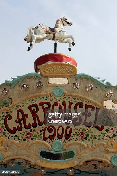 horse on top of a french carrousel - beaune france stock pictures, royalty-free photos & images