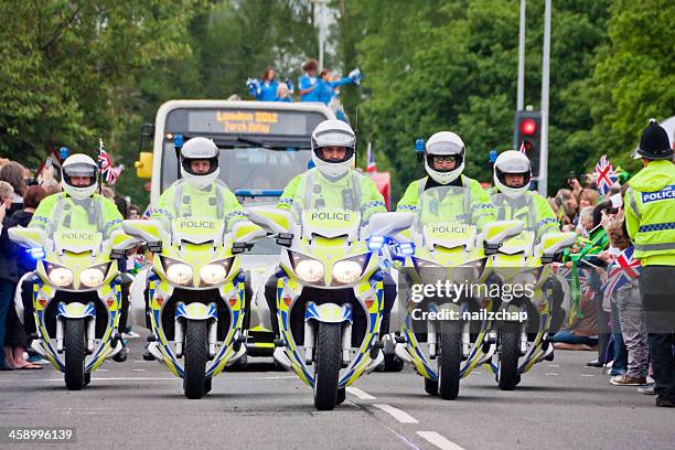 london 2012 olympic torch relay - police motorbike stock pictures, royalty-free photos & images