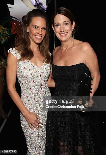 Actress Hilary Swank and author Gillian Flynn, winner of the Hollywood Screenwriter Award attend the 18th Annual Hollywood Film Awards at The...