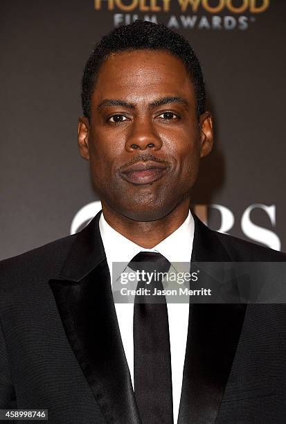 Actor/director Chris Rock, winner of Hollywood Comedy Film for 'Top Five,' poses in the press room during the 18th Annual Hollywood Film Awards at...