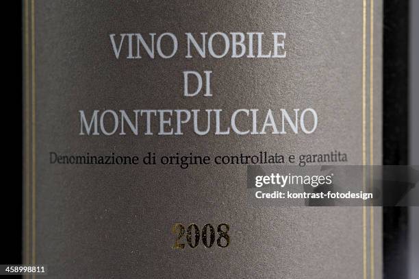 label of an vino nobile di montepulciano wine bottle - montepulciano stock pictures, royalty-free photos & images
