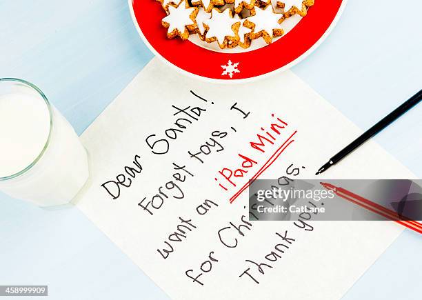 i want an ipad mini for christmas - editorial writing stock pictures, royalty-free photos & images