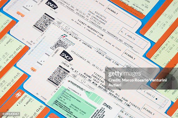 european rail tickets laid on table - travel background - train ticket stock pictures, royalty-free photos & images