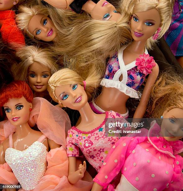 bunch of barbie fashon dolls - barbie princess stock pictures, royalty-free photos & images