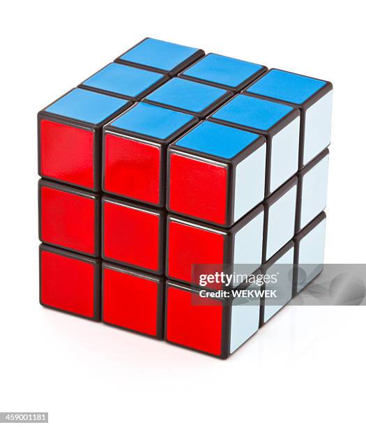 classic rubik's cube on white background - puzzle cube stock pictures, royalty-free photos & images