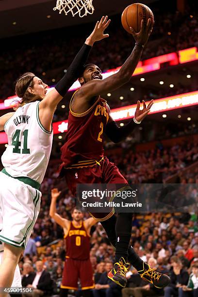 Kyrie Irving of the Cleveland Cavaliers drives to the basket against cc41 in the second half at TD Garden on November 14, 2014 in Boston,...