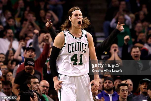 Kelly Olynyk of the Boston Celtics celebrates after a play in the second half against the Cleveland Cavaliers at TD Garden on November 14, 2014 in...