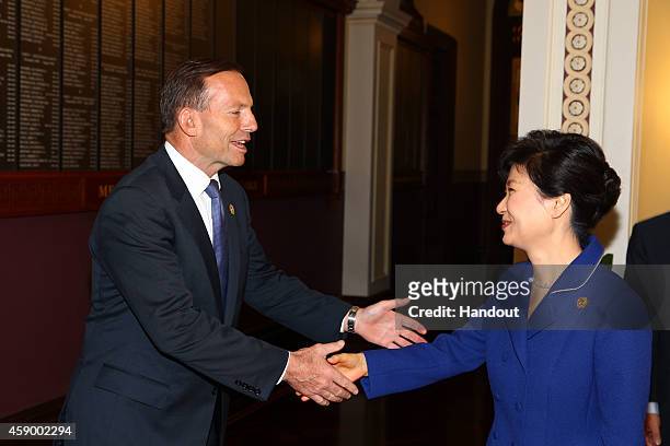 In this handout photo provided by the G20 Australia, Australia's Prime Minister Tony Abbott greets Republic of Korea's President Park Geun-hye in the...