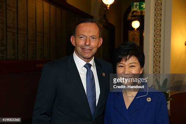 In this handout photo provided by the G20 Australia, Australia's Prime Minister Tony Abbott greets Republic of Korea's President Park Geun-hye in the...