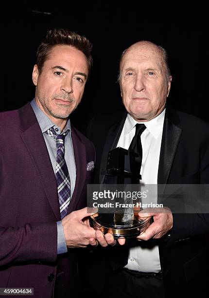 Actors Robert Downey Jr. And Robert Duvall, winner of Hollywood Supporting for 'The Judge,' attend the 18th Annual Hollywood Film Awards at The...