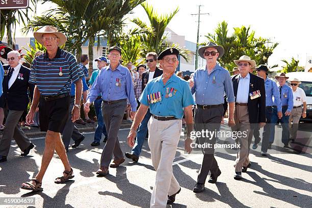 past servicemen marching on anzac day - anzac day stock pictures, royalty-free photos & images
