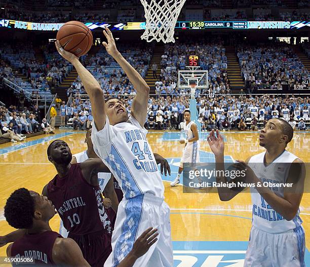 North Carolina's Justin Jackson muscles his way to the basket against North Carolina Central's Anthony McDonald during the first half on Friday, Nov....