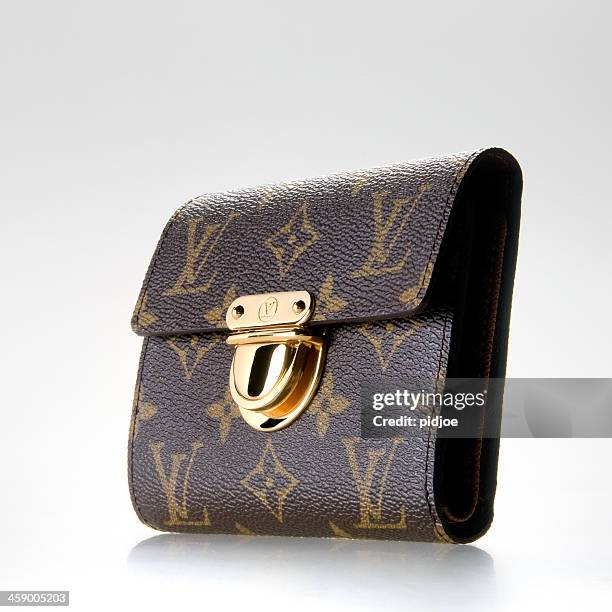louise vuitton wallet for women - louis vuitton purse stock pictures, royalty-free photos & images