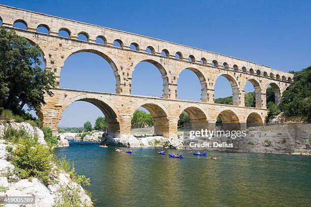 pont du gard - pont du gard aqueduct stock-fotos und bilder