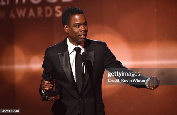 Actor-comedian Chris Rock accepts the Hollywood Comedy Film Award for 'Top Five' onstage during the 18th Annual Hollywood Film Awards at The...