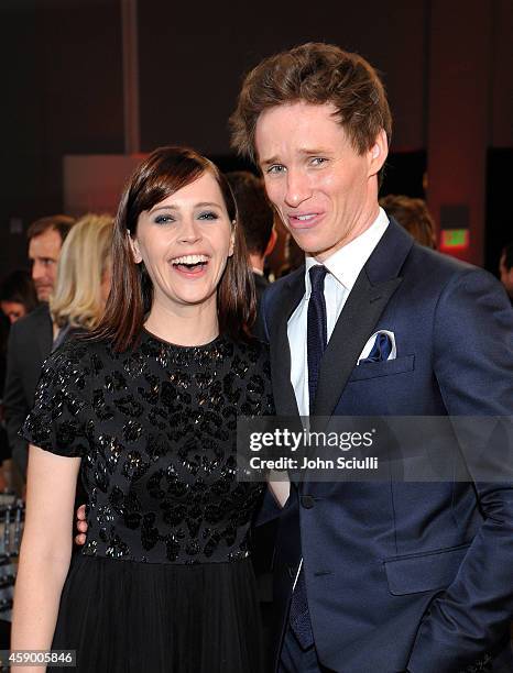 Actors Felicity Jones and Eddie Redmayne attend the 18th Annual Hollywood Film Awards at The Palladium on November 14, 2014 in Hollywood, California.