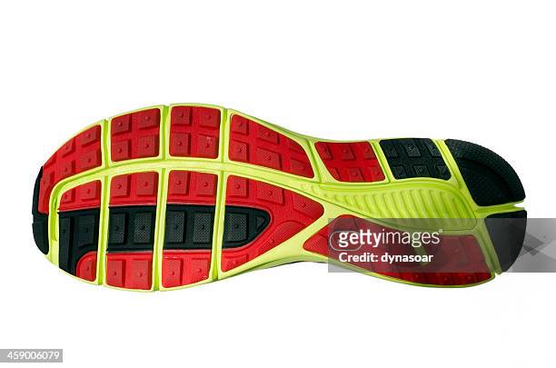 sole of a nike lunarglide trainer - nike trainer stock pictures, royalty-free photos & images