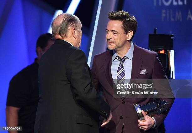 Actor Robert Duvall accepts the Hollywood Supporting Actor Award for 'The Judge' from actor Robert Downey Jr. Onstage during the 18th Annual...