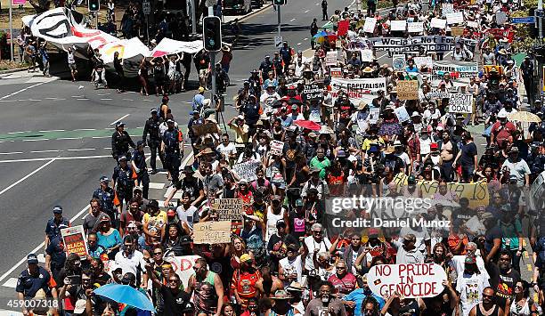 Thousands of people march during a protests against G20 summit on November 15, 2014 in Brisbane, Australia. World leaders have gathered in Brisbane...