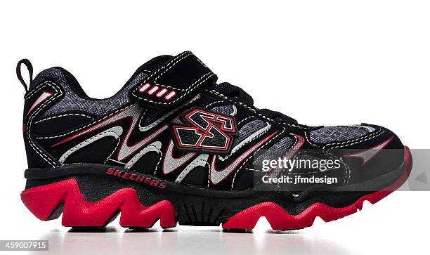 skechers sneaker boy shoe - skechers shoes stock pictures, royalty-free photos & images