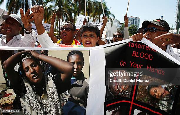 Woman shouts slogans against genocide in Ethiopia during a protest against G20 leaders on November 15, 2014 in Brisbane, Australia. World leaders...