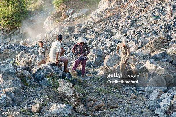 Humans Breaking Down Rocks 125 Rock Breaking Hammer Stock Photos, High-Res Pictures, and Images ...