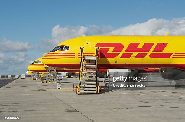 dhl boeing 757-200sf cargo aircraft - cargo planes at leipzig airport stock pictures, royalty-free photos & images