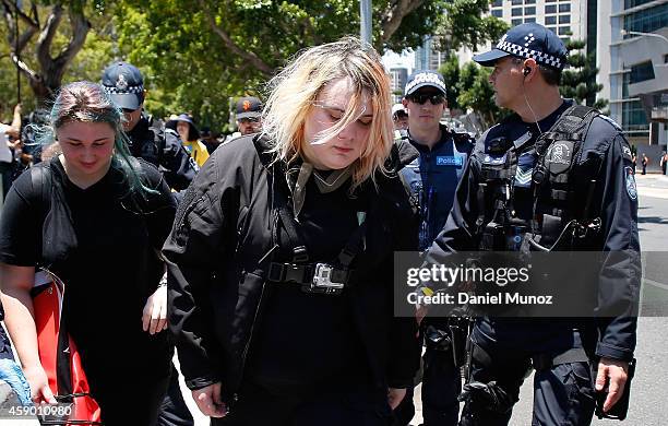 Woman is arrested by police under temporary G20 laws during a protest against G20 leaders on November 15, 2014 in Brisbane, Australia. World leaders...