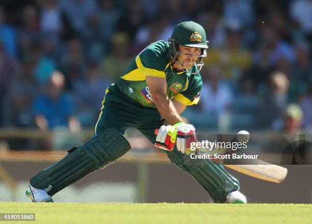 Glenn Maxwell of Australia plays a reverse sweep during game one of the men's one day international series between Australia and South Africa at WACA...