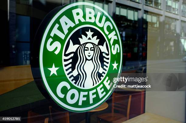 starbucks coffee sign - starbucks stock pictures, royalty-free photos & images