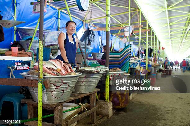 fish market - el salvador woman stock pictures, royalty-free photos & images